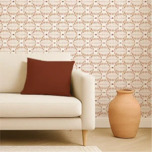 Reed Rhythm wallpaper in terracotta tones with terracotta planter and neutral couch – modern botanical interior from the Flow Collection by Eldy Pattern Design.